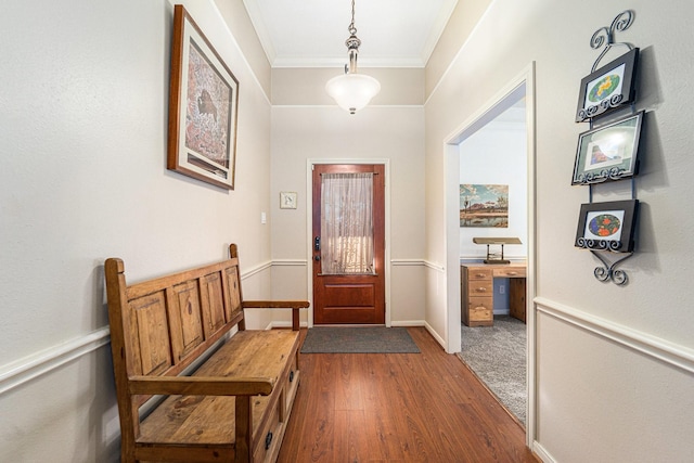 entryway featuring baseboards, ornamental molding, and dark wood-style flooring