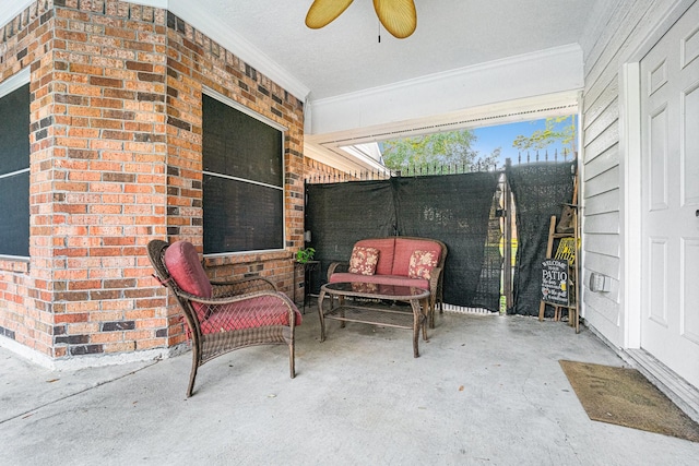 view of patio featuring ceiling fan