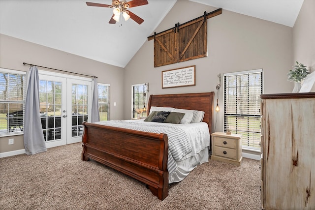 bedroom featuring a ceiling fan, access to exterior, carpet flooring, french doors, and high vaulted ceiling