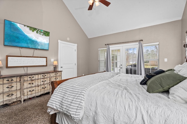 carpeted bedroom with access to exterior, high vaulted ceiling, a ceiling fan, and french doors