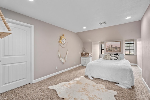 carpeted bedroom featuring recessed lighting, visible vents, vaulted ceiling, and baseboards