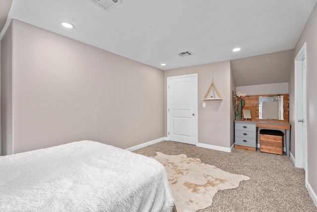 carpeted bedroom with baseboards, visible vents, and recessed lighting