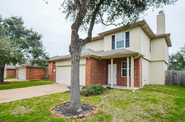 traditional home with driveway, a front yard, and brick siding