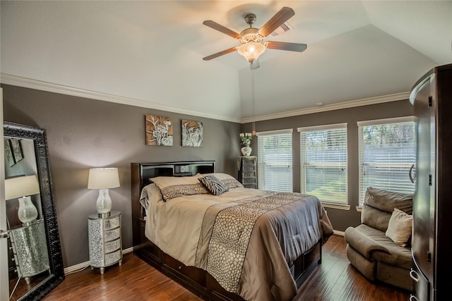 bedroom featuring lofted ceiling, a ceiling fan, crown molding, baseboards, and dark wood-style flooring