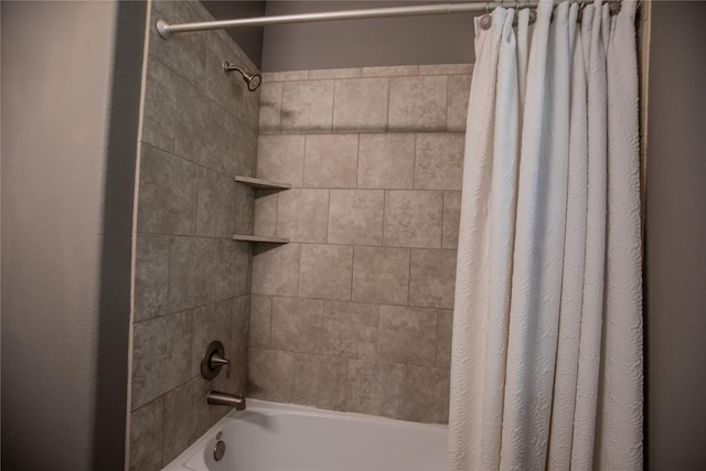 bathroom featuring shower / bath combination with curtain