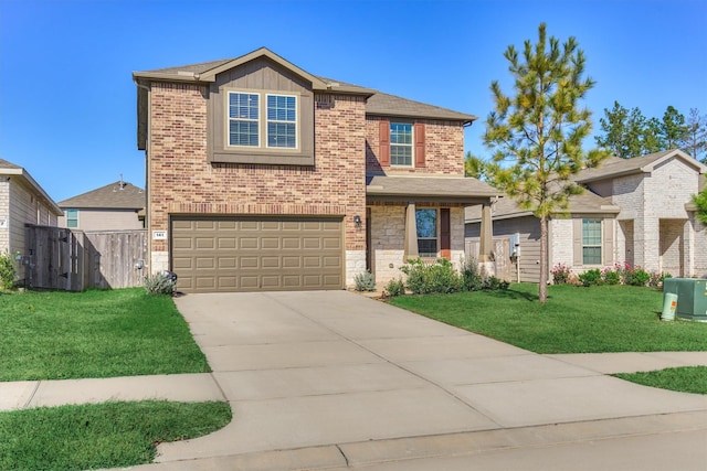 view of front of property with an attached garage, a front yard, fence, stone siding, and driveway