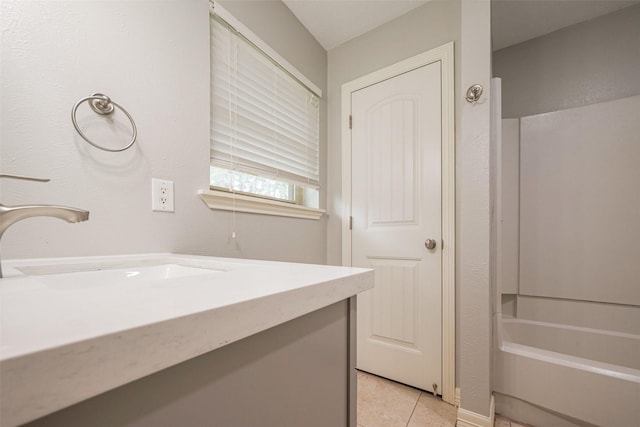 full bathroom featuring vanity and tile patterned floors