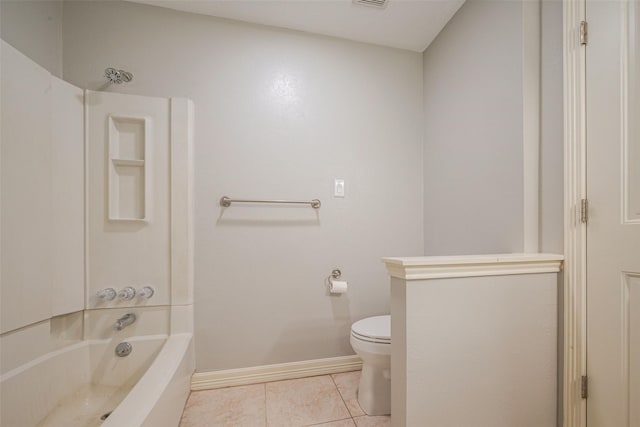 full bathroom featuring shower / washtub combination, tile patterned floors, toilet, and baseboards