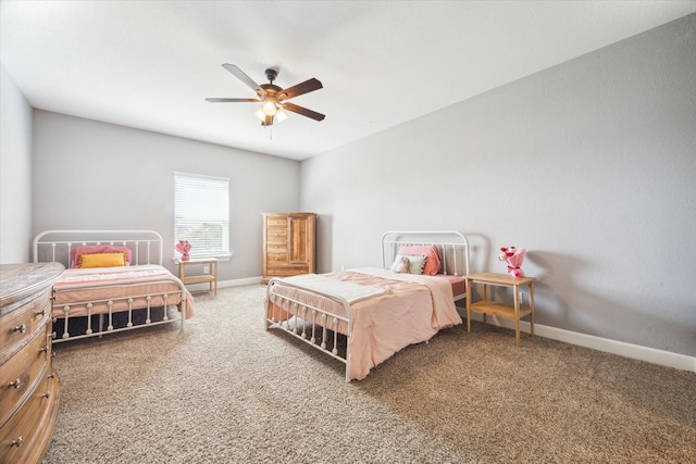 bedroom featuring carpet floors, a ceiling fan, and baseboards