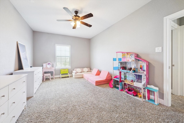 game room featuring carpet, ceiling fan, and baseboards