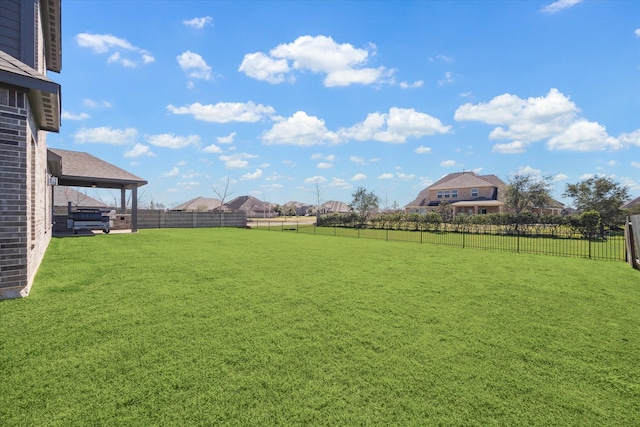 view of yard featuring a fenced backyard