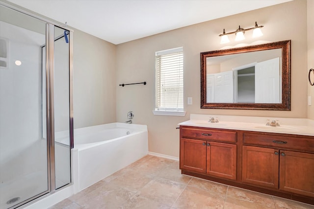 bathroom with double vanity, a sink, a bath, and a shower stall