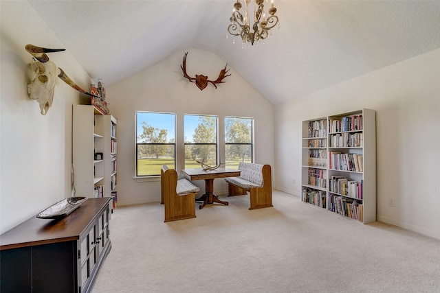 living area featuring a chandelier, light carpet, high vaulted ceiling, and baseboards