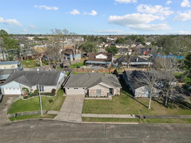 drone / aerial view with a residential view