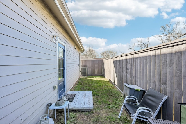 view of yard featuring a fenced backyard and cooling unit