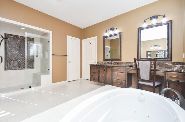 full bath featuring tile patterned floors, vanity, a tub with jets, and a shower stall