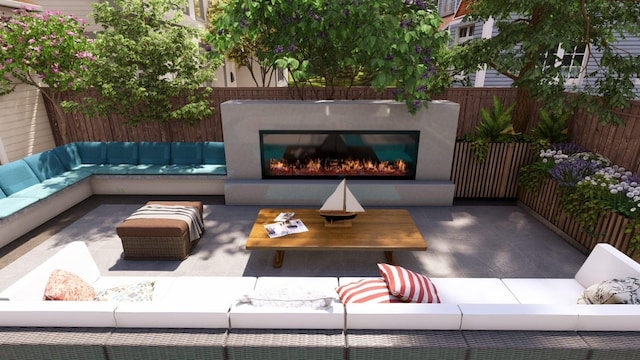 view of patio with an outdoor living space with a fireplace and fence