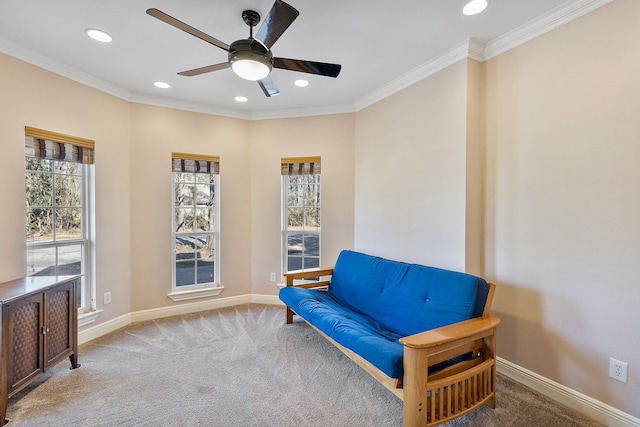 living area with baseboards, a ceiling fan, crown molding, carpet floors, and recessed lighting