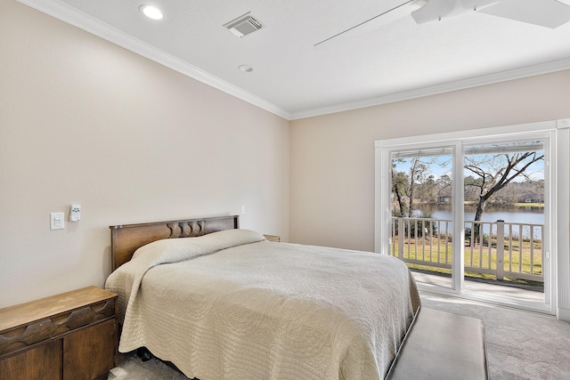 bedroom featuring access to outside, ornamental molding, carpet flooring, and visible vents