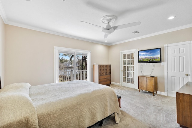 bedroom with light carpet, ornamental molding, visible vents, and baseboards