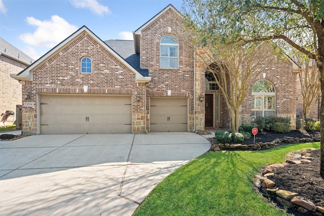 traditional home with an attached garage, brick siding, a shingled roof, stone siding, and concrete driveway