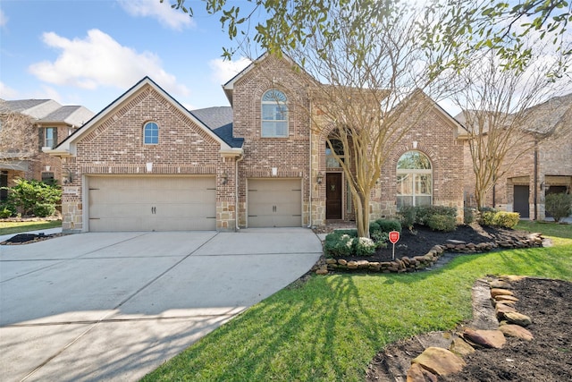 traditional-style home with driveway and brick siding