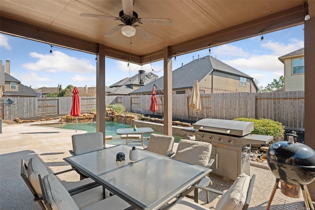 view of patio / terrace with a fenced in pool, area for grilling, a ceiling fan, outdoor dining space, and a fenced backyard