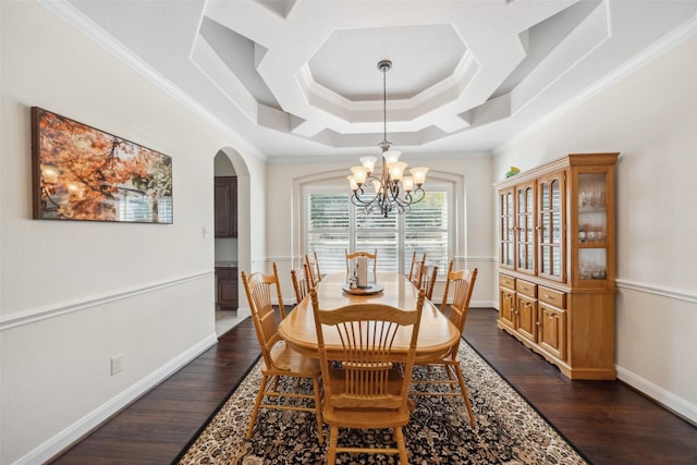 dining area with ornamental molding, arched walkways, a chandelier, and dark wood finished floors