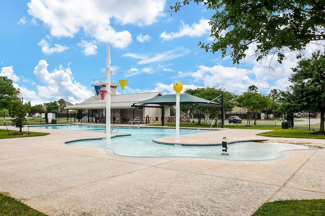 surrounding community featuring a swimming pool and fence