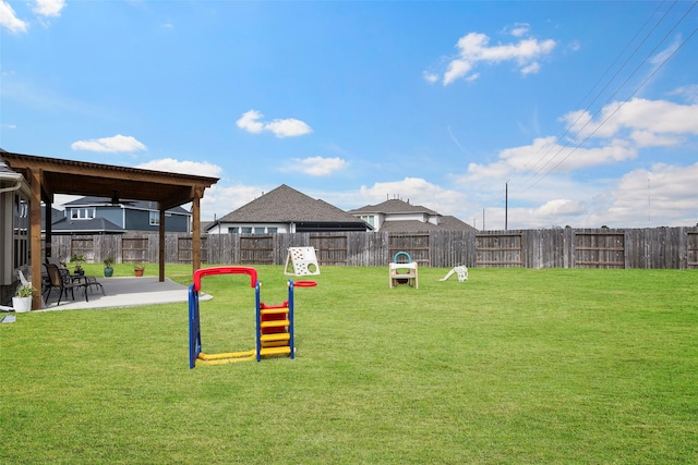 surrounding community featuring a lawn and fence