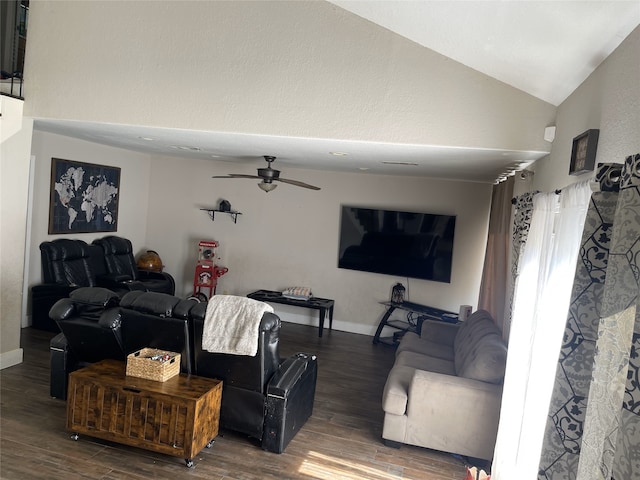 living room with ceiling fan, baseboards, vaulted ceiling, and wood finished floors