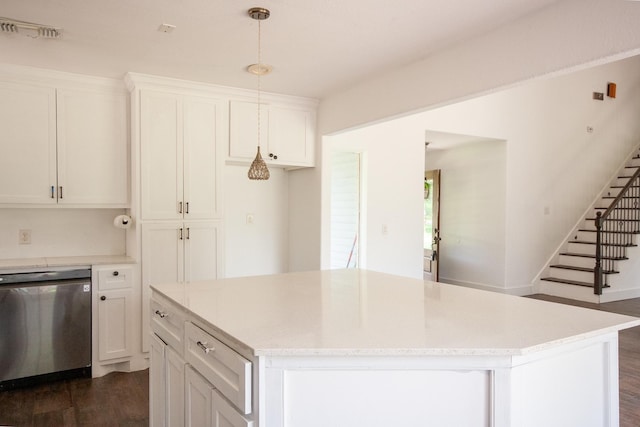 1523 Bamwick Dr, Houston, TX 77090 - kitchen featuring dishwasher, a kitchen island, dark wood finished floors, and white cabinetry