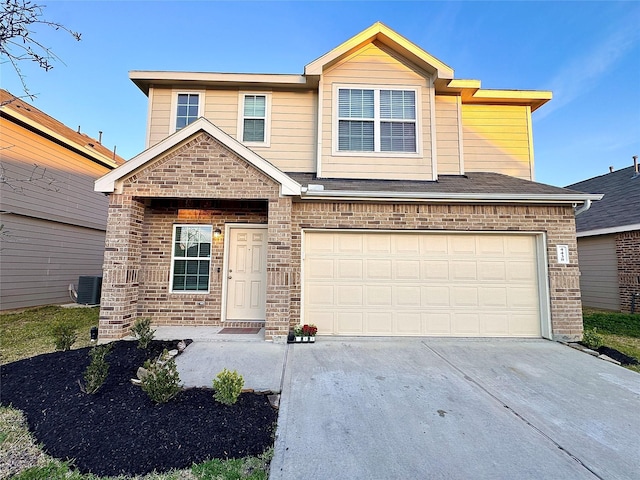 view of front facade featuring an attached garage, cooling unit, concrete driveway, and brick siding