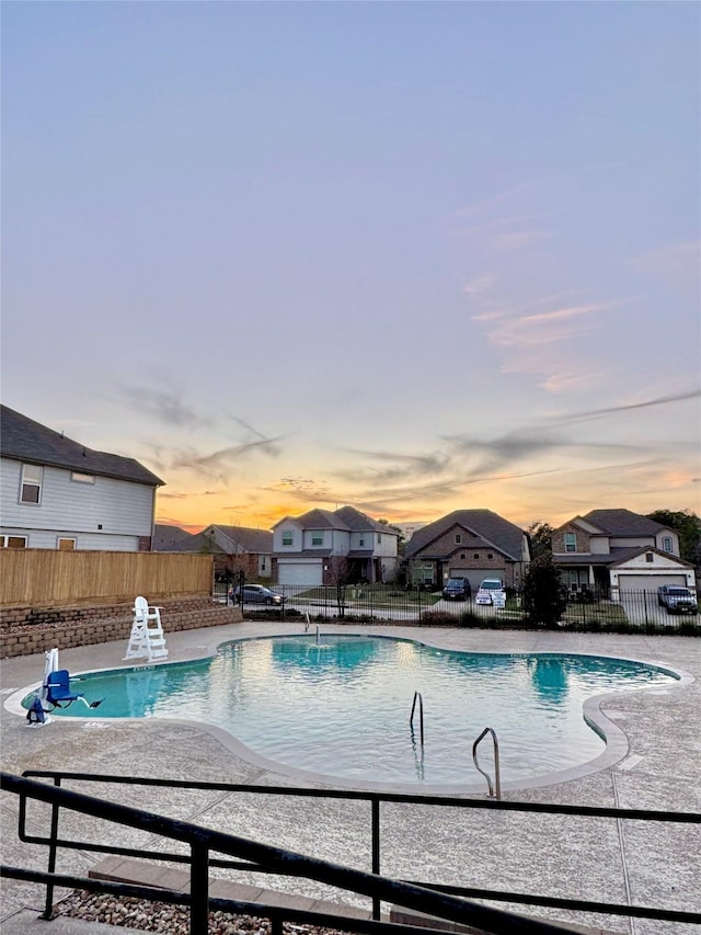 view of pool featuring fence, a fenced in pool, and a patio