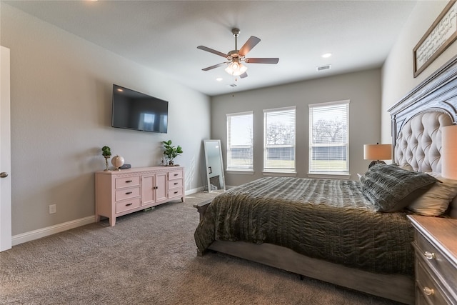 carpeted bedroom with ceiling fan, recessed lighting, visible vents, and baseboards