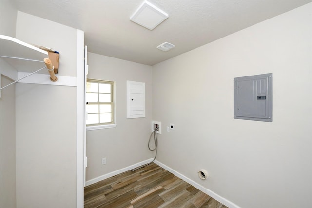 laundry area featuring laundry area, electric panel, wood finished floors, washer hookup, and electric dryer hookup