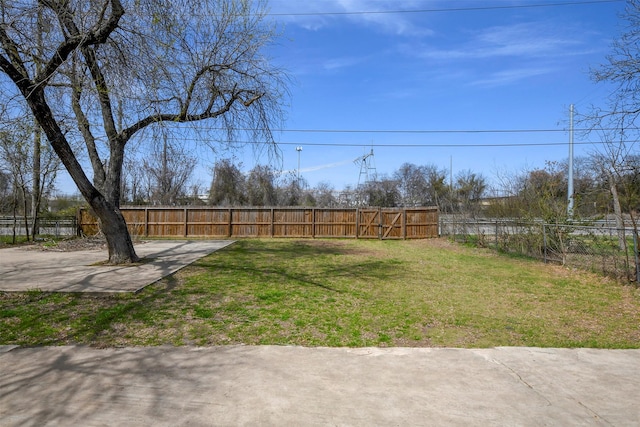 view of yard featuring fence