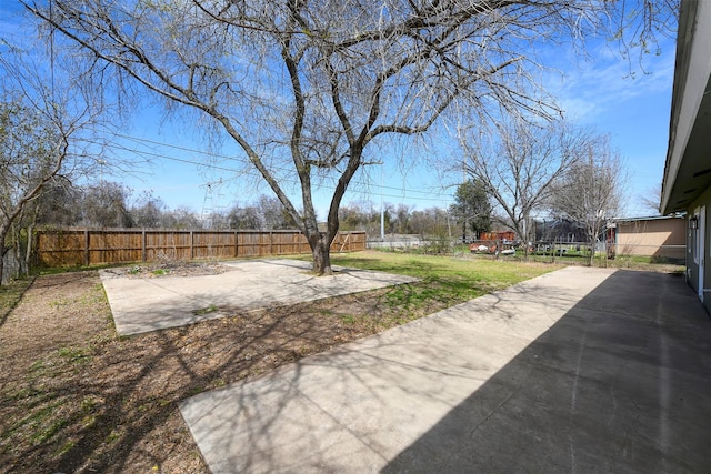 view of yard with a patio area and a fenced backyard