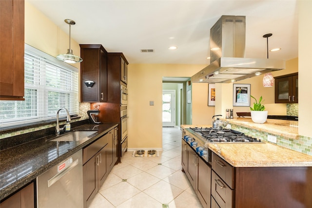 kitchen with a sink, appliances with stainless steel finishes, backsplash, and island exhaust hood