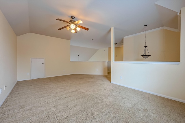 additional living space featuring carpet floors, baseboards, a ceiling fan, and vaulted ceiling