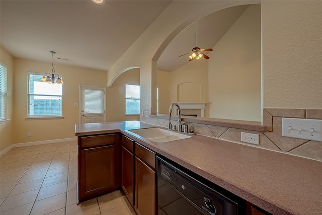 kitchen with light tile patterned floors, visible vents, a sink, light countertops, and dishwasher