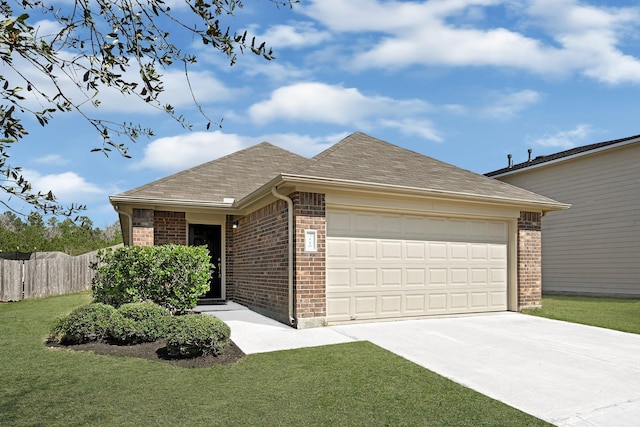 ranch-style house with brick siding, concrete driveway, an attached garage, fence, and a front yard