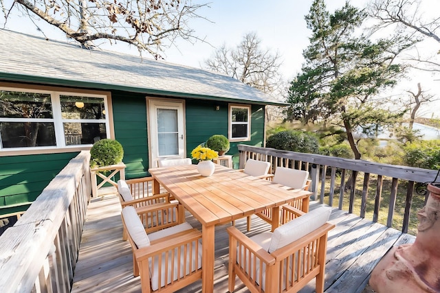 deck with outdoor dining space