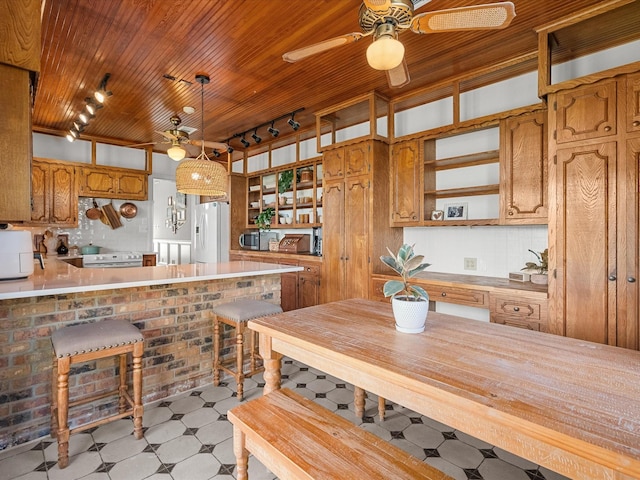 kitchen with light floors, open shelves, wooden ceiling, brown cabinetry, and white appliances