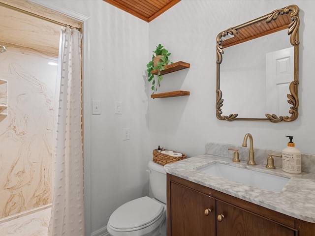 full bathroom featuring curtained shower, vanity, and toilet