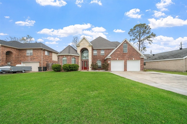 718 S Diamondhead Blvd, Crosby, TX 77532 - traditional-style home featuring driveway, brick siding, and a front lawn