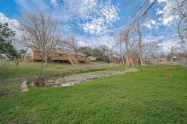 view of yard with a deck