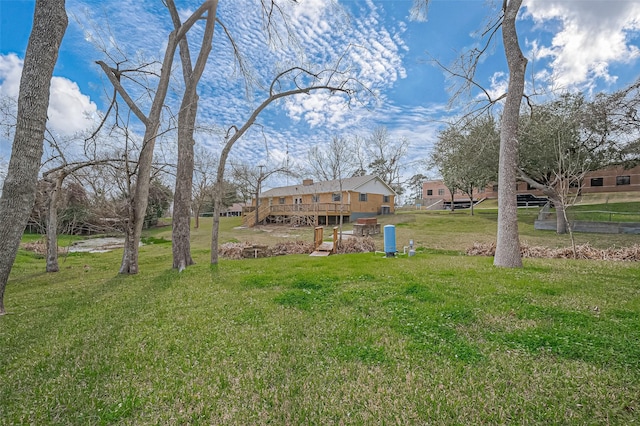 view of yard with a wooden deck