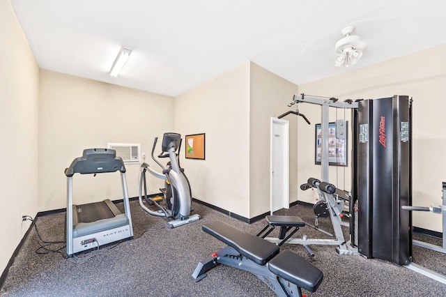 exercise area featuring baseboards and visible vents