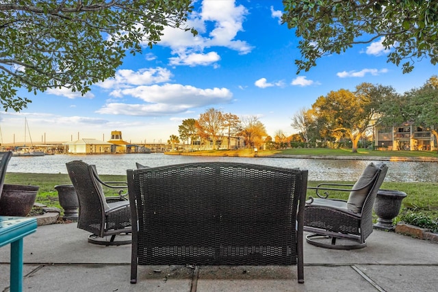 view of patio featuring a water view